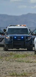 Police cars on a rocky desert terrain, showcasing a dynamic and adventurous scene.