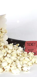 Popcorn and movie reel wallpaper for cinema lovers.