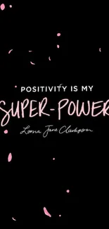 Mobile wallpaper with pink text 'Positivity is my superpower' on black background.