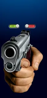 Hand holding a gun with on off switches against a deep blue background.