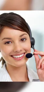 Mobile wallpaper of a smiling service representative with a headset.