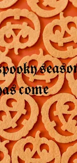 Pumpkin Halloween wallpaper with spooky text.