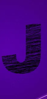 Purple textured letter J on a vibrant background.