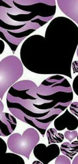 Purple and black hearts with zebra stripes wallpaper.