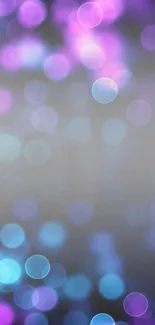 Bokeh light effect in purple and blue hues creating a serene mobile wallpaper.