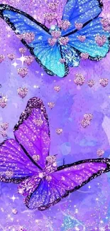 Purple and blue butterflies with sparkles on a mystical background.