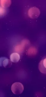 Purple bokeh wallpaper with dreamy blurred circles.