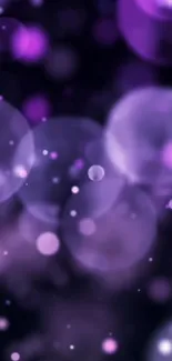 Purple bokeh wallpaper with soft luminous circles.