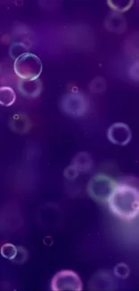 Purple bubble wallpaper with vibrant floating bubbles.