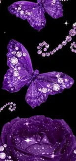 Purple butterflies and rose decorated with gemstones on a black background.