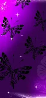 Mobile wallpaper with purple and black butterfly design, adorned with sparkles.