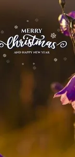 Purple flower with Merry Christmas text on a mobile wallpaper.