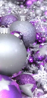 Vibrant purple and silver Christmas ornaments photo.