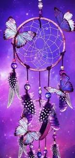 Purple dreamcatcher with butterflies and feathers.