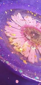 Pink daisy in sparkling resin with purple highlights.