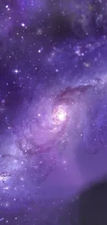 Purple galaxy swirling with stars, perfect mobile wallpaper.