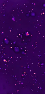 Purple galaxy wallpaper with sparkling stars.