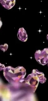 Purple gemstone hearts floating on black background.