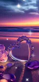 Purple crystal heart and rose on beach at sunset.