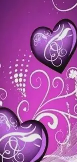 Vibrant purple heart wallpaper with floral swirls.