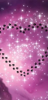 Purple galaxy wallpaper with heart and paw prints.