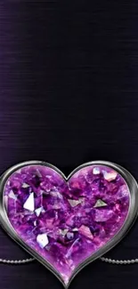 Purple gemstone heart on dark background.