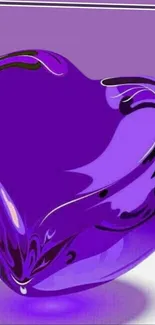 Mobile wallpaper featuring a shiny purple glass heart design.