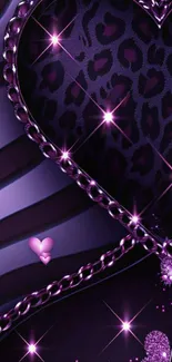 Purple heart with glitter and chain details on wallpaper background.
