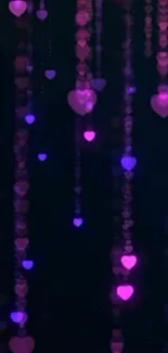 Glowing purple hearts on a dark background wallpaper.