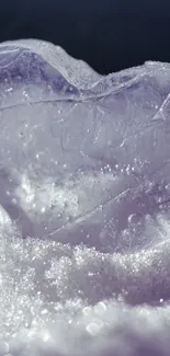 Purple heart-shaped ice sculpture with glistening crystals.