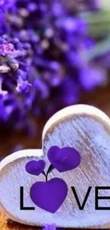 Purple heart love wallpaper with lavender flowers.