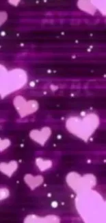 Purple heart wallpaper with pink hearts and sparkles.