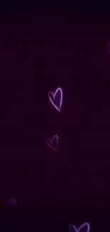 Vibrant purple heart mobile wallpaper with glowing patterns on a dark background.