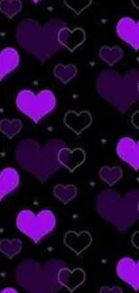 Purple hearts pattern on black background wallpaper.