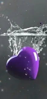 Purple heart submerged in water on dark backdrop wallpaper.