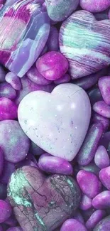 Purple heart-shaped stones on a bed of smaller purple stones.