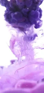 Mobile wallpaper featuring purple ink swirling creatively on a white background.