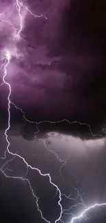 Dramatic purple lightning in dark stormy night sky.