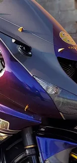 Close-up of a purple motorcycle with sleek, metallic design accents.