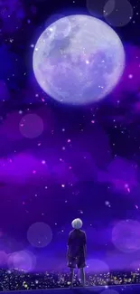 Lone figure under a purple night sky and bright full moon wallpaper.