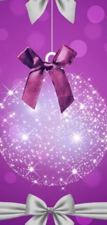 Festive purple wallpaper with sparkling ornament and ribbon bow.