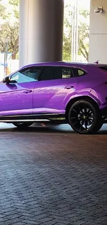 Purple luxury SUV parked in urban setting under soft lighting.