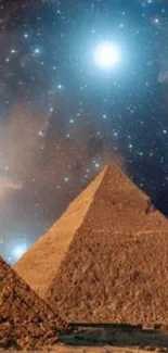 Pyramids under a stunning starry sky with a bright celestial backdrop.