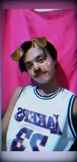 Selfie with a dog filter on a pink background.