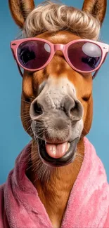 Horse wearing pink sunglasses and robe against blue background.