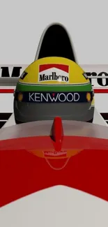 Close-up of racing car helmet in red and yellow tones.