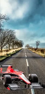 Red racing car on open road under blue sky wallpaper.