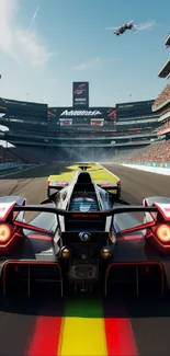 Racing car speeding down a vibrant track at the raceway with a clear sky above.