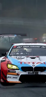 High-speed racing car on a foggy track.