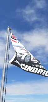 Racing flag waving against a clear blue sky with clouds.